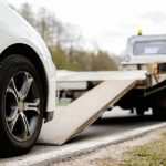 loading-broken-car-on-tow-truck